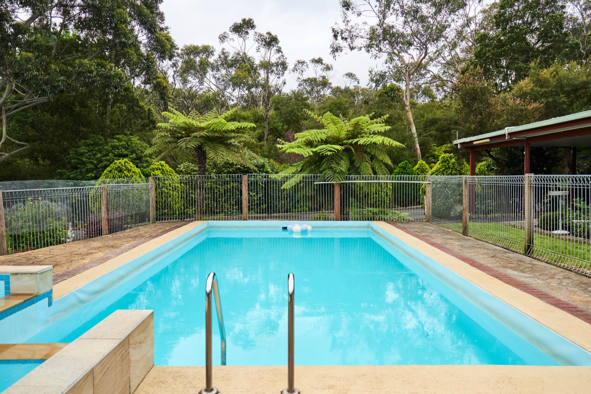 Garden grounds and pool area at Sanctuary House in Healesville