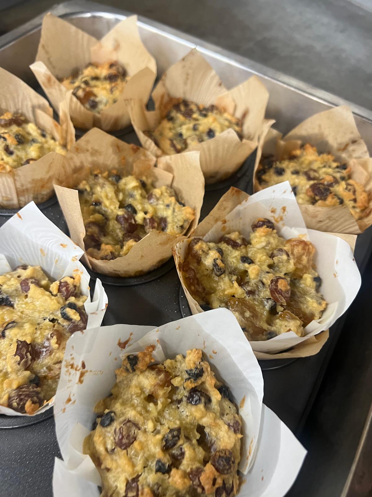 Tray of fruit muffins fresh from the oven in the Sanctuary House kitchen