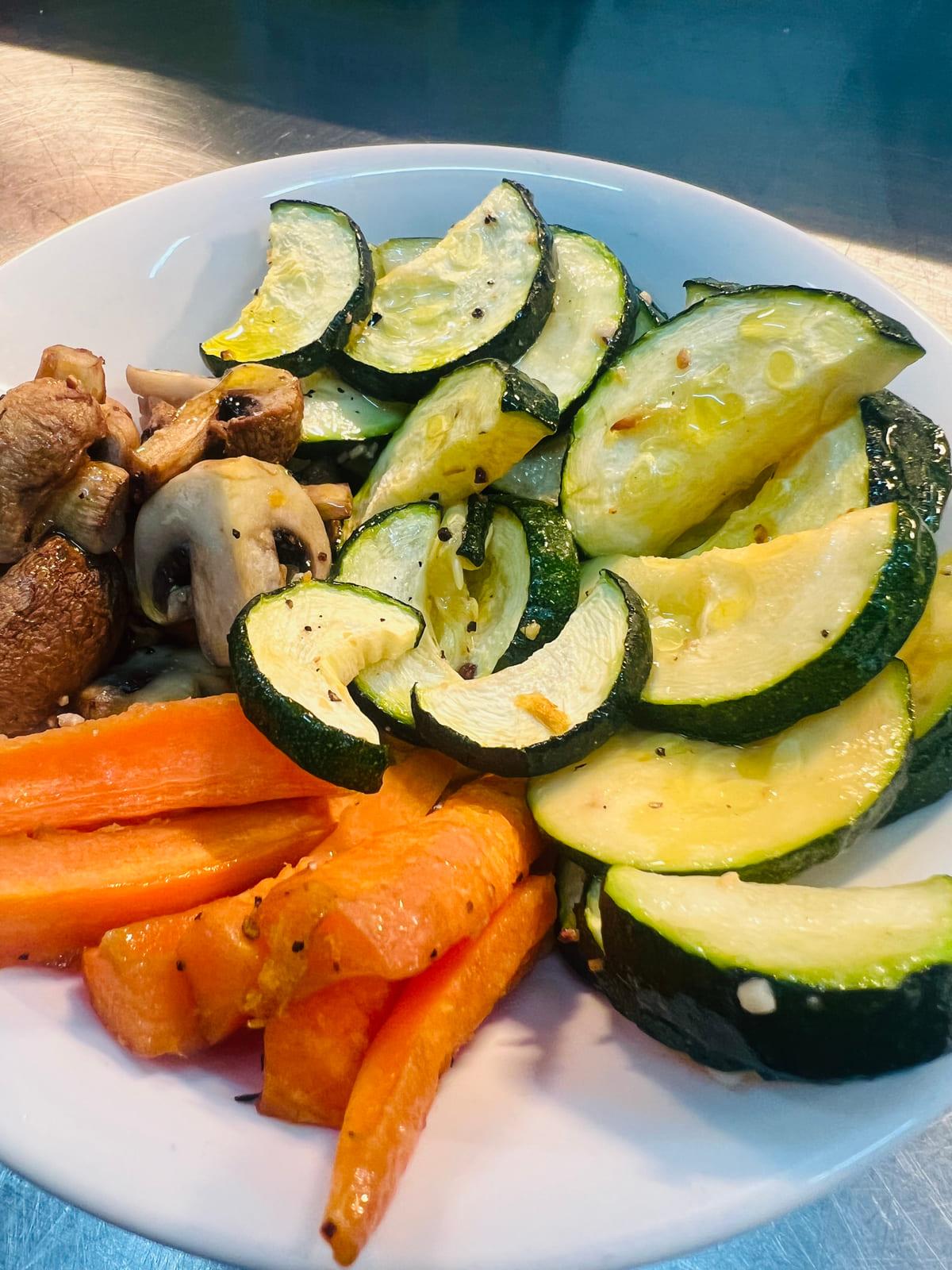 Seasonal Greens — zucchini, glazed carrots and sautéed mushrooms